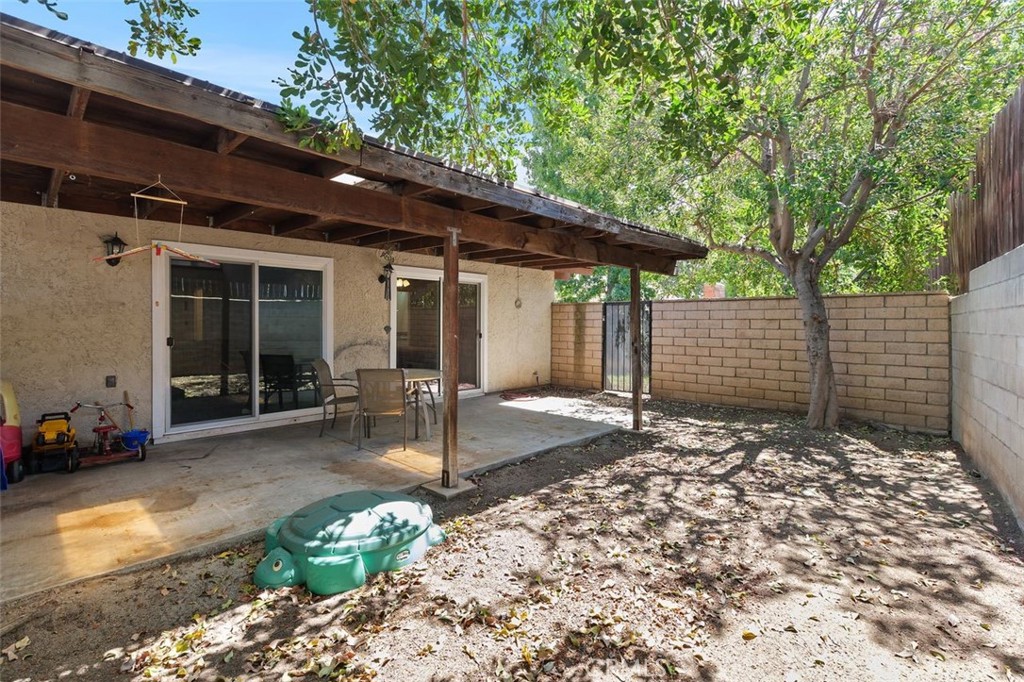 5082 Los Olivos Way Riverside, CA 92505 - Photo 36 of 36 a front view of a house with a yard