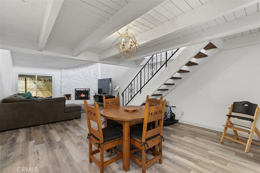 5082 Los Olivos Way Riverside, CA 92505 - Photo 6 of 36 a living room with furniture and a wooden floor