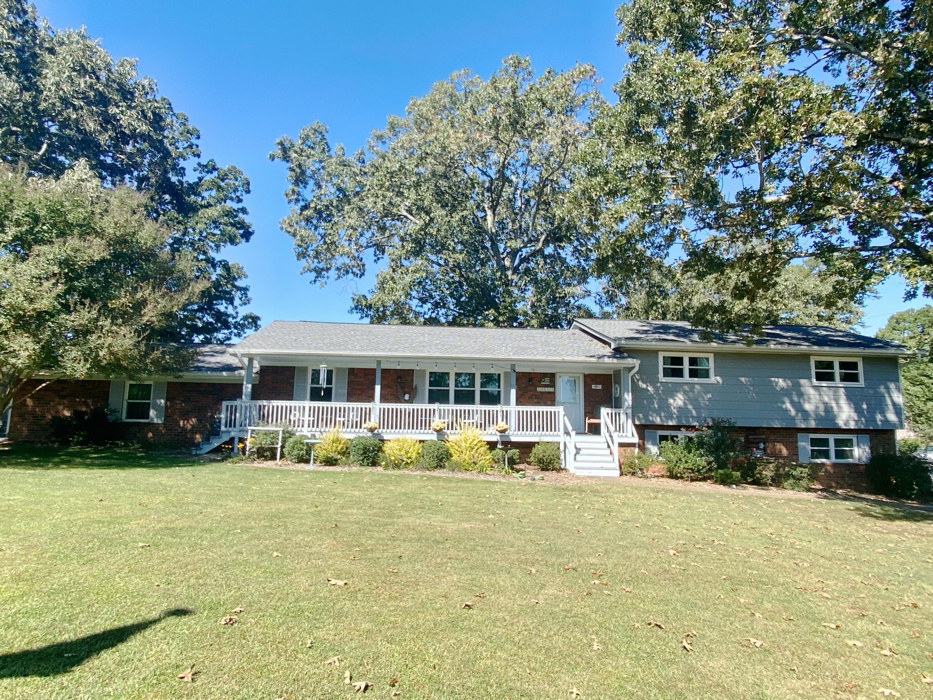 7514 Sutton Road Ooltewah, TN 37363 - Photo 1 of 41 front
