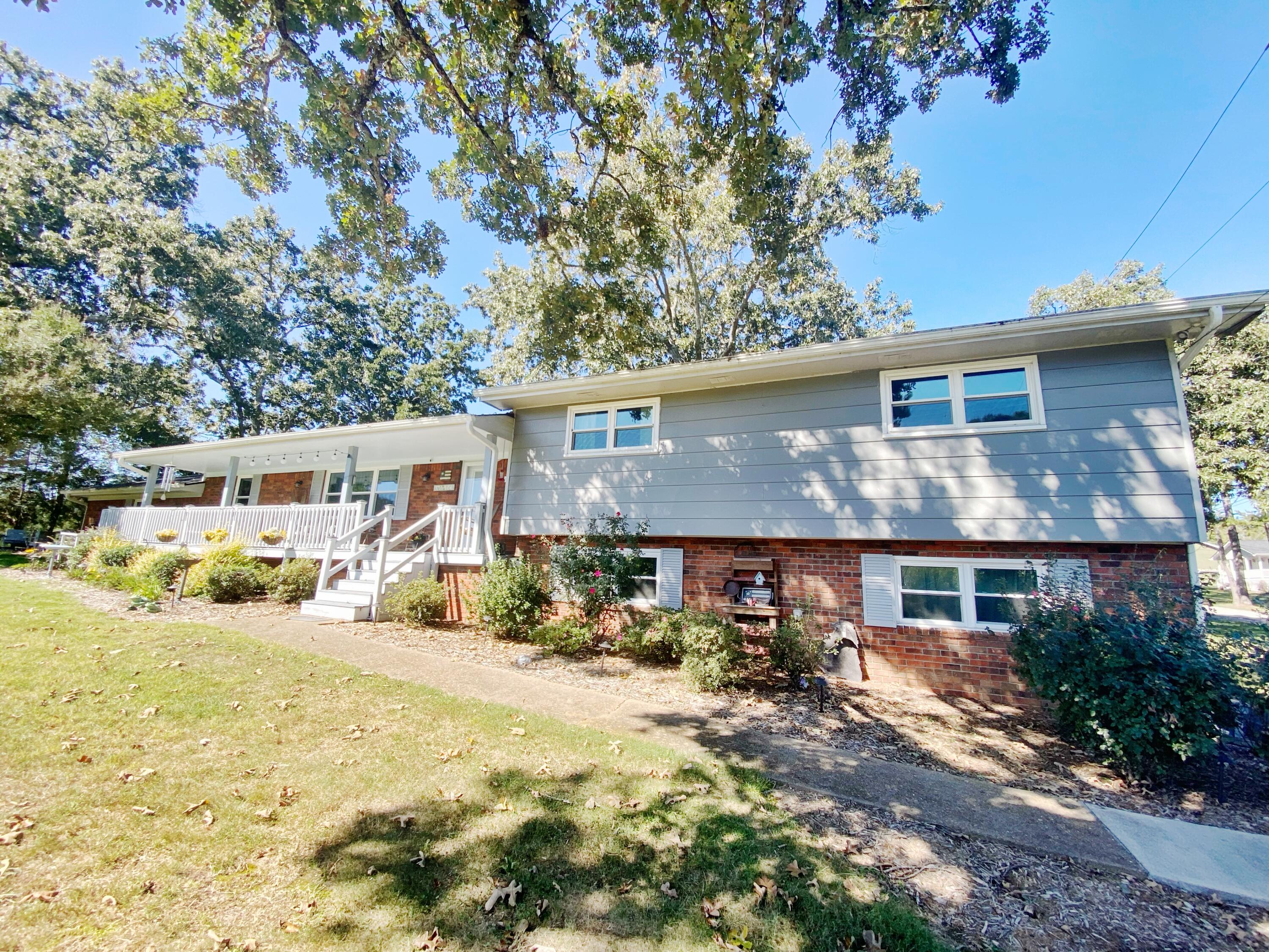 7514 Sutton Road Ooltewah, TN 37363 - Photo 2 of 41 front