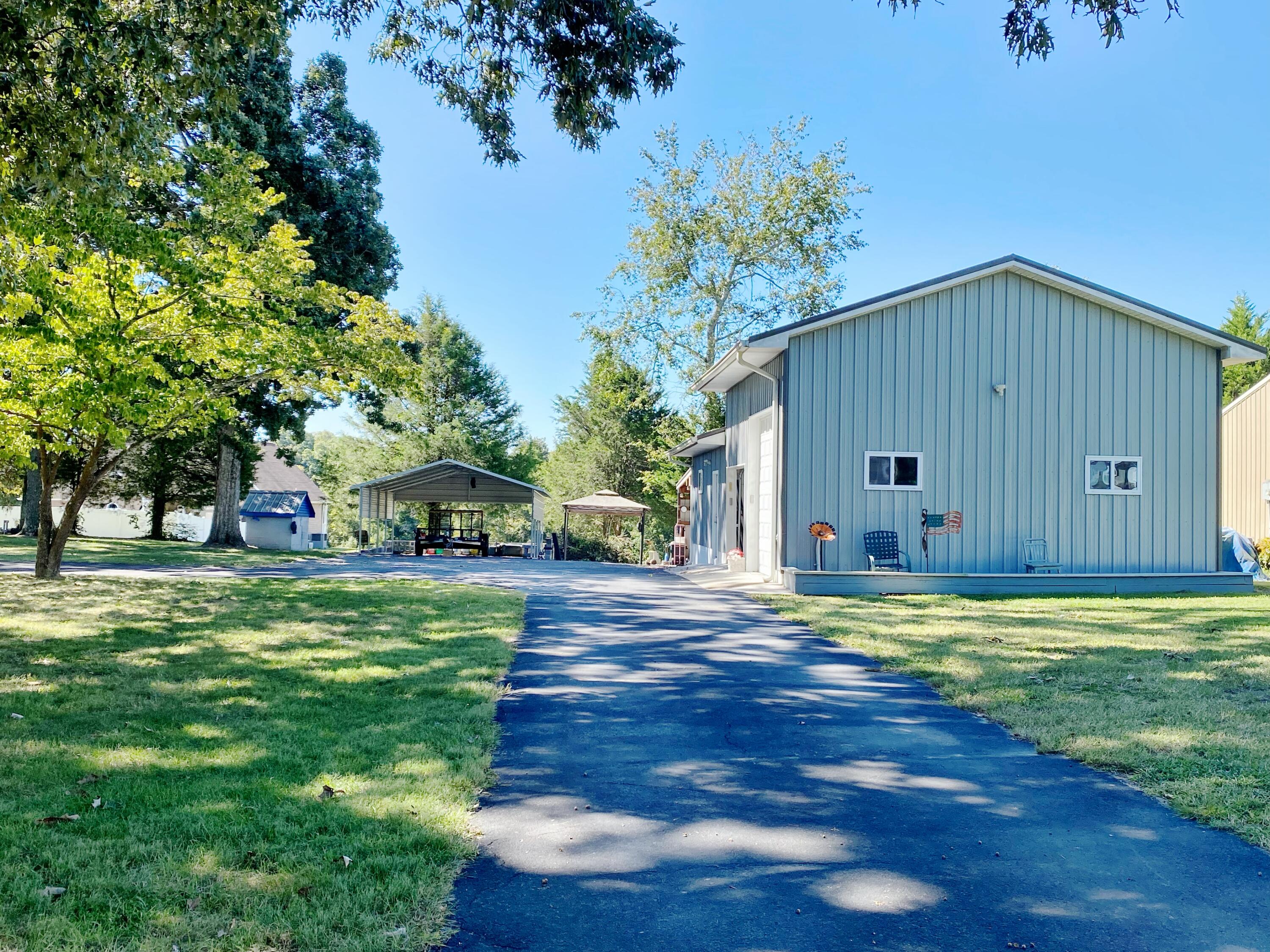 7514 Sutton Road Ooltewah, TN 37363 - Photo 39 of 41 drive to detached garage