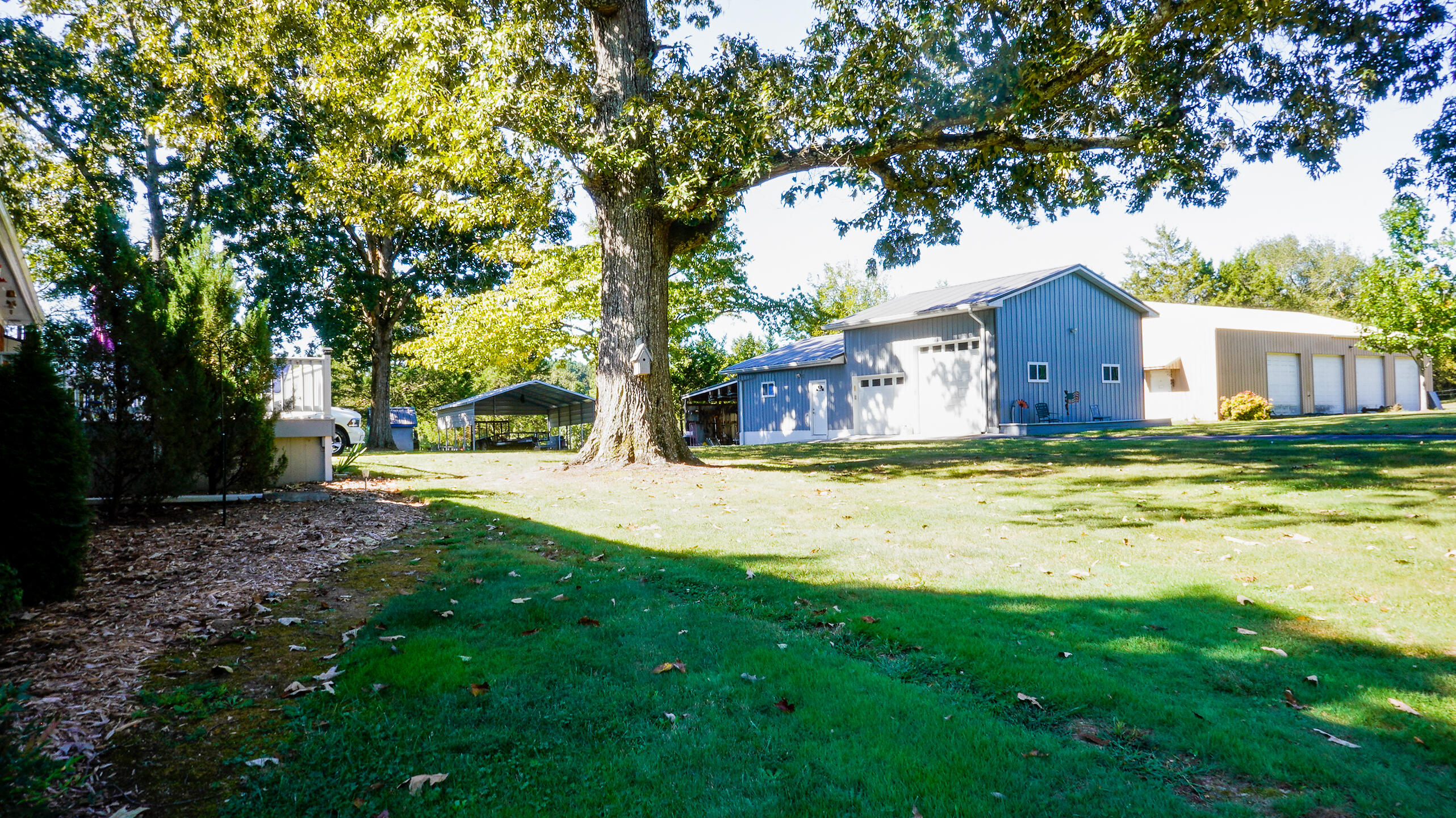 7514 Sutton Road Ooltewah, TN 37363 - Photo 6 of 41 side view from street