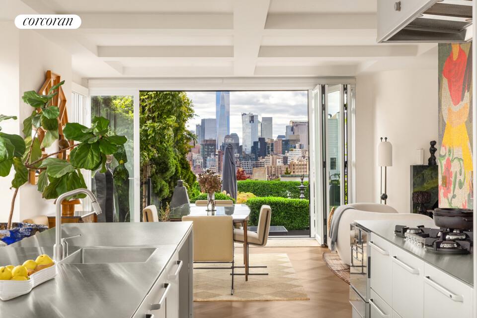 65 West 13th Street, Unit PHD Manhattan, NY 10011 - Photo 6 of 24 a living room with patio furniture and a floor to ceiling window