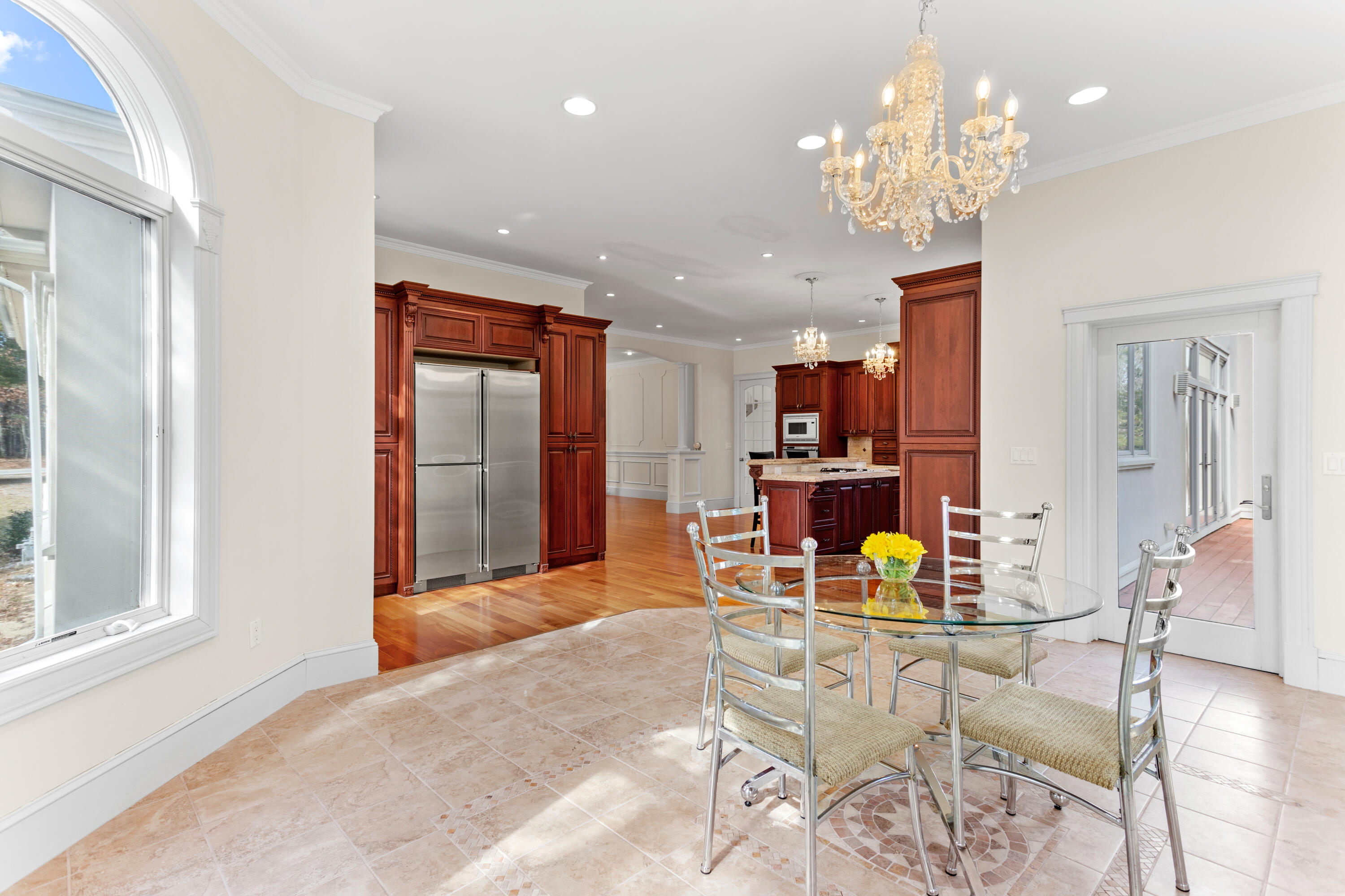 10 Starboard Lane Osterville, MA 02655 - Photo 3 of 22 a view of a dining room with furniture and chandelier