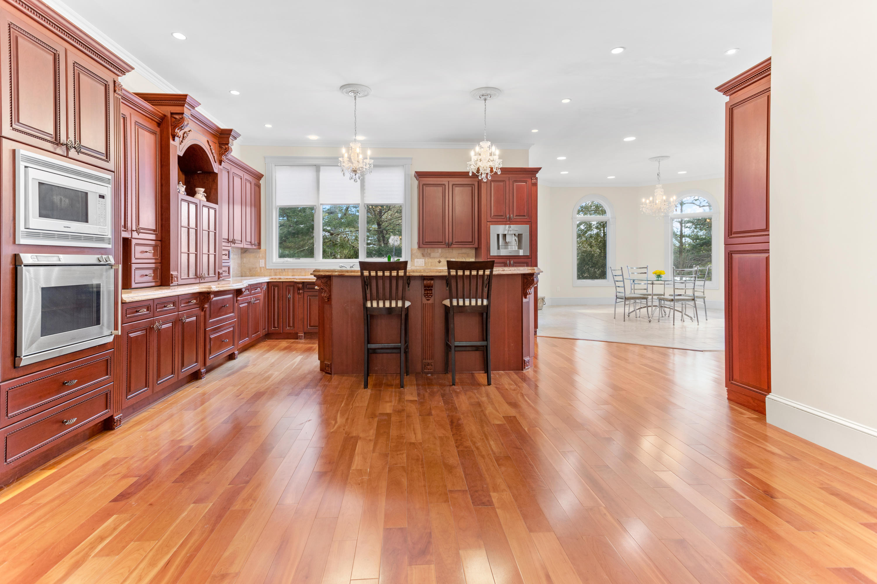 10 Starboard Lane Osterville, MA 02655 - Photo 4 of 22 a open kitchen with stainless steel appliances granite countertop a stove and a wooden floors