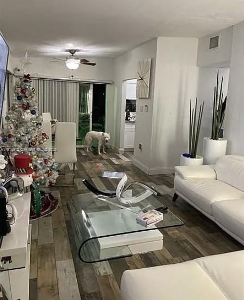 2125 Northwest 126th Street Miami, FL 33167 - Photo 2 of 6 a living room with furniture and flowers