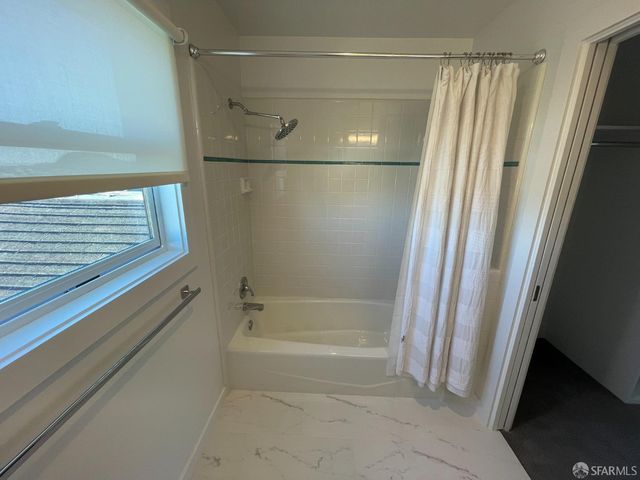 a window sitting in a room next to a window