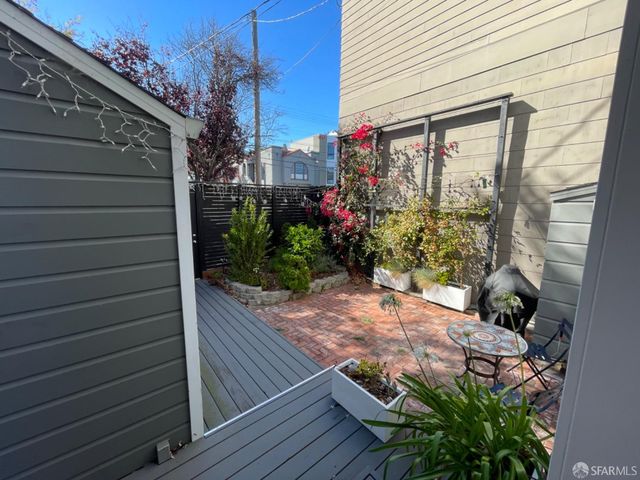 a view of a wooden fence