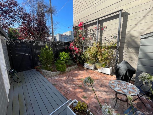 a balcony with wooden floor