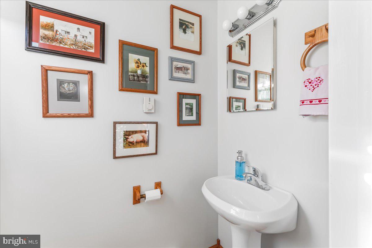 179 Davis Road Coatesville, PA 19320 - Photo 12 of 45 half bath off family room