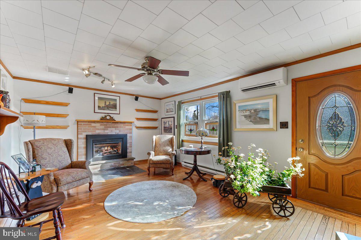 179 Davis Road Coatesville, PA 19320 - Photo 10 of 45 Family room with fireplace