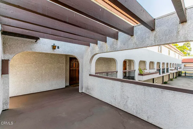 a view of a car park in front of a building