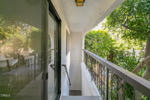 a view of staircase with white walls