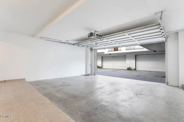 a view of house with outdoor space and trees