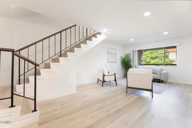 a view of a livingroom with furniture and a couch