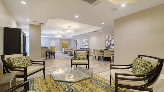 a living room with fireplace furniture and a flat screen tv