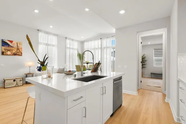 a living room with furniture and window