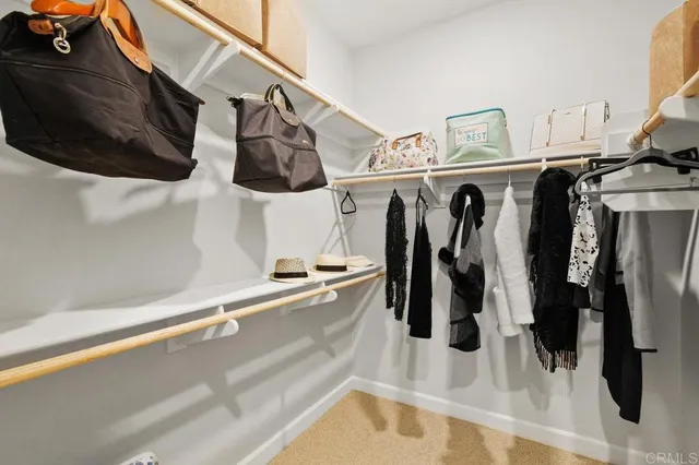 a view of a chair and table in front of house