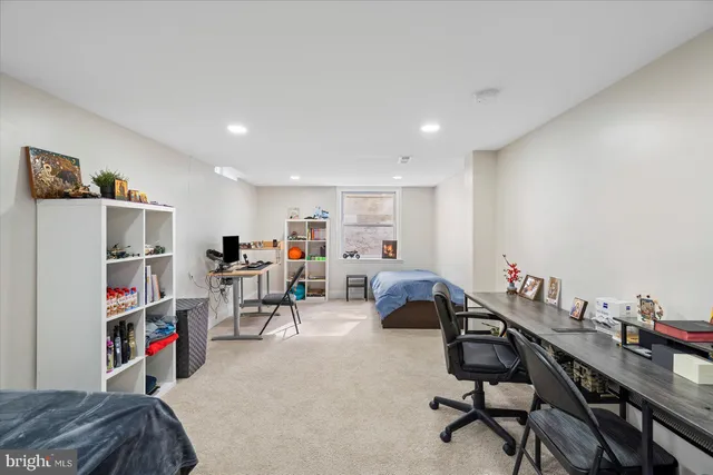 a room with furniture and a flat screen tv