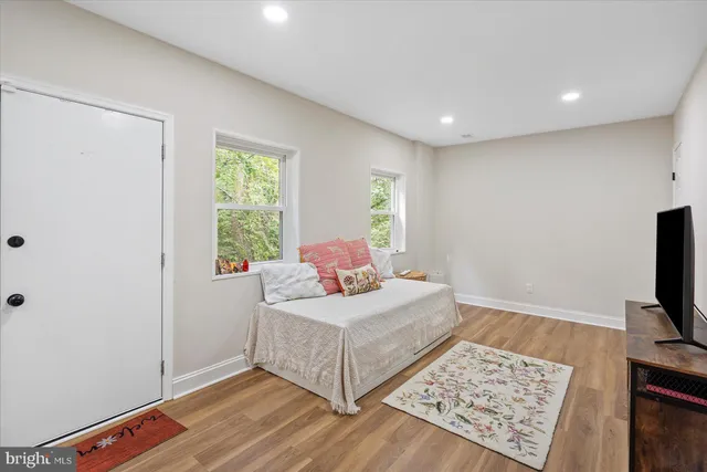 a bathroom with a sink vanity and a mirror