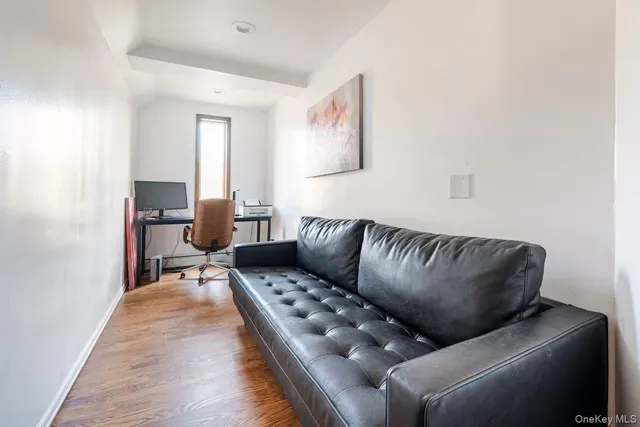 a view of a chairs and table in a backyard