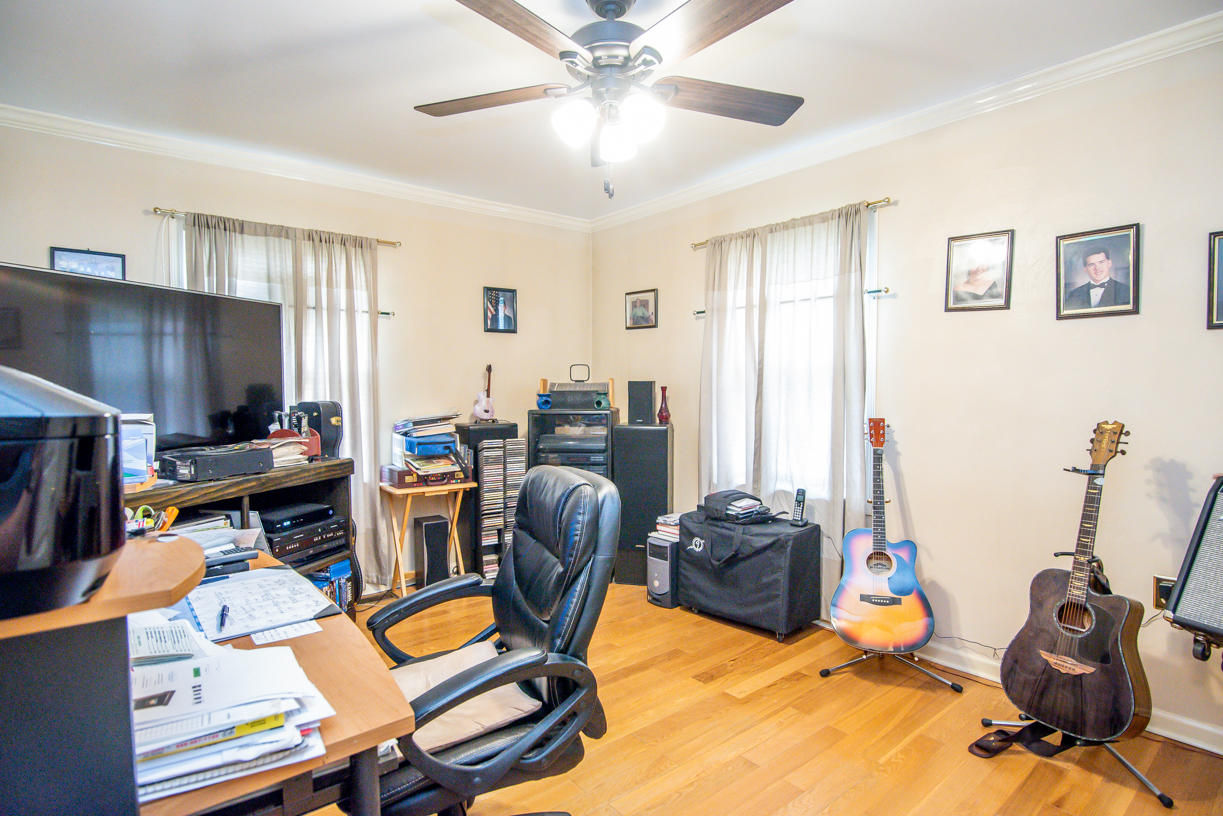 1057 Carroll Road Goodview, VA 24095 - Photo 22 of 46 a view of a workspace with furniture and gym equipment