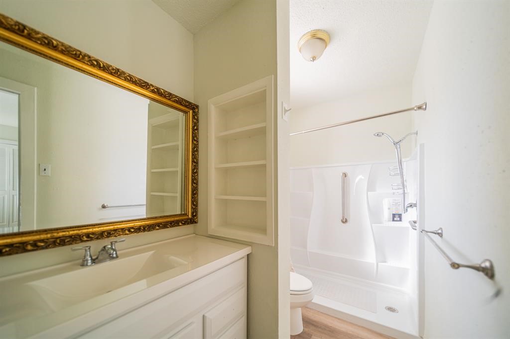 5400 Sheldon Street Houston, TX 77008 - Photo 11 of 18 a bathroom with a shower and a sink