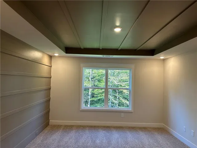 a bathroom with a shower and a sink