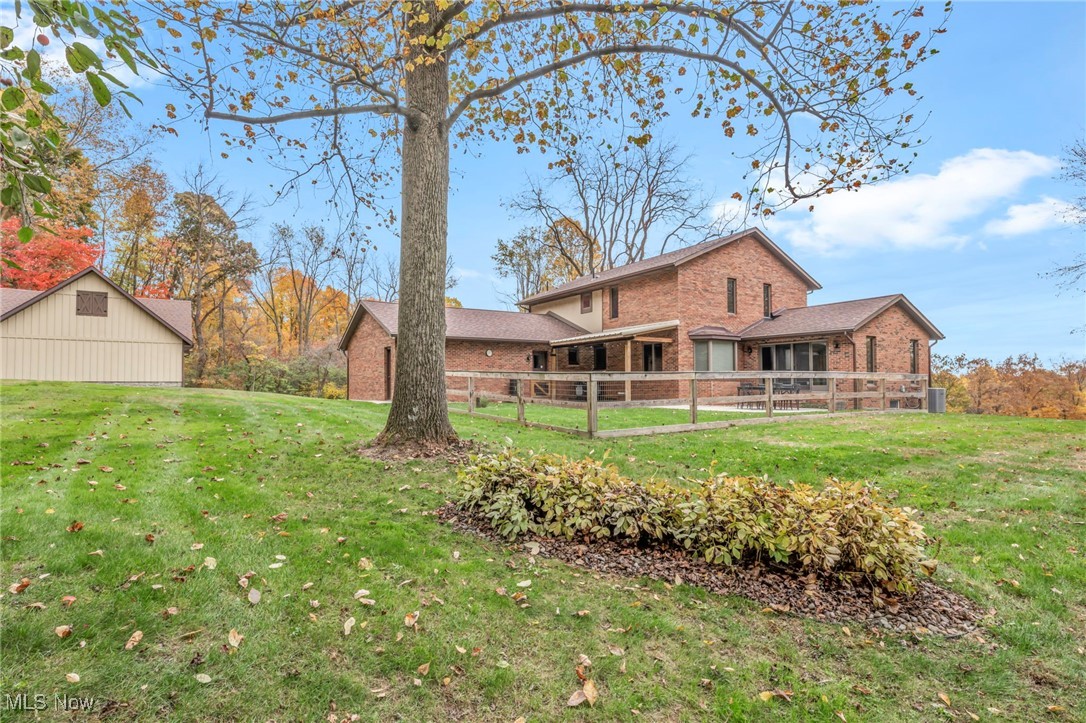 16340 Galehouse Road Doylestown, OH 44230 - Photo 46 of 50 Rear view of property featuring a lawn