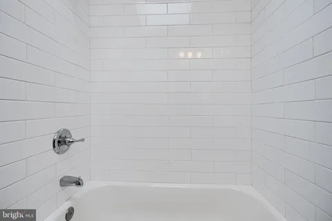 a close up of a bathtub