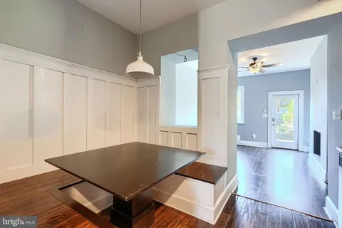 wooden floor in a hall with an entryway