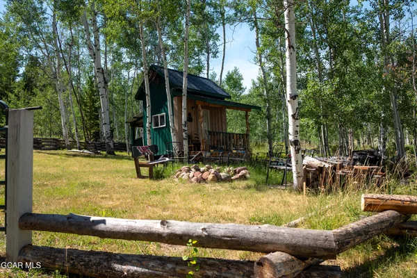 a view of a wooden deck with a bench