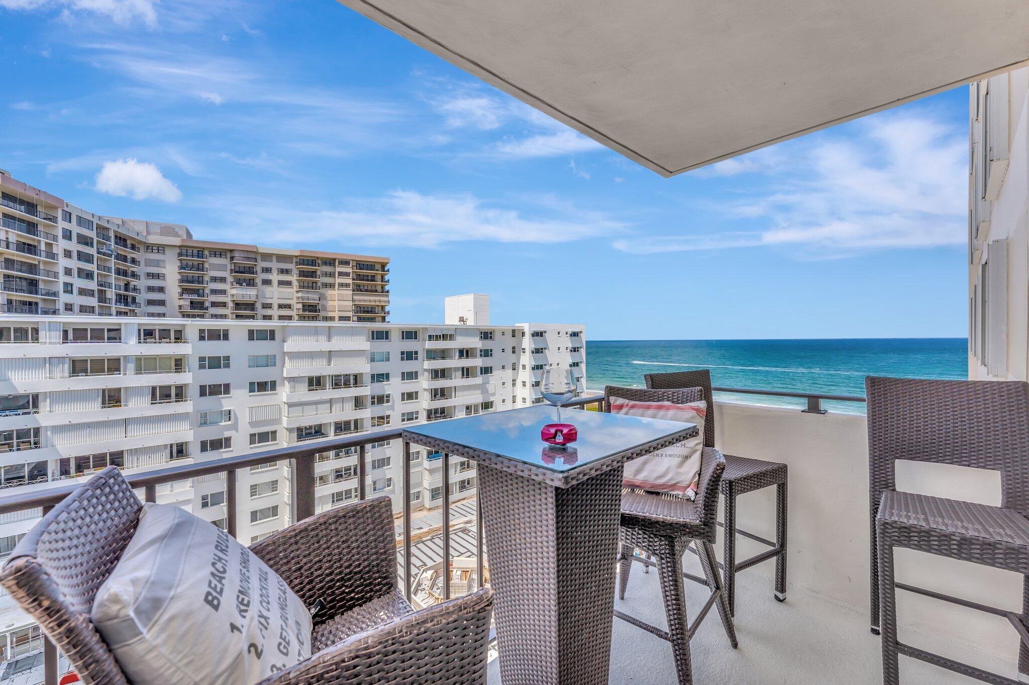1900 South Ocean Boulevard, Unit 8G Pompano Beach, FL 33062 - Photo 15 of 54 a view of a roof deck with furniture