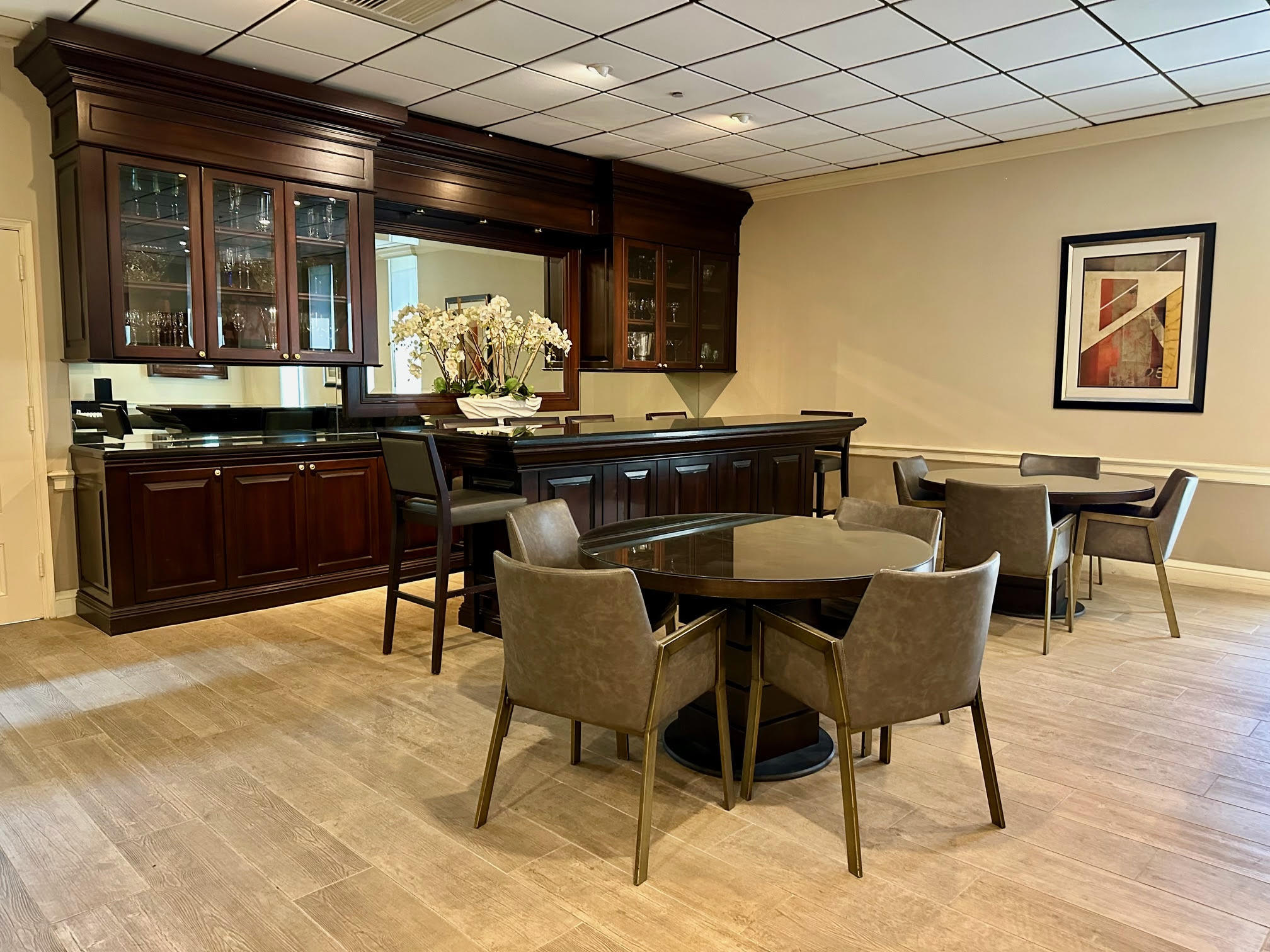 1900 South Ocean Boulevard, Unit 8G Pompano Beach, FL 33062 - Photo 43 of 54 a kitchen with a table and chairs in it