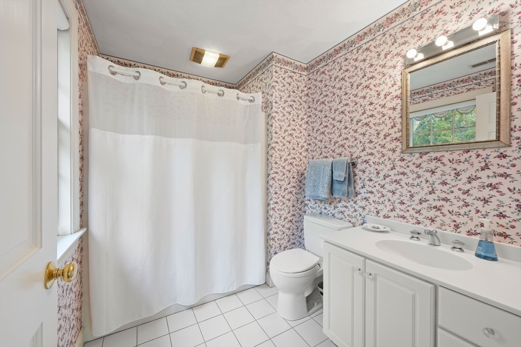 37 Old Planters Road Beverly, MA 01915 - Photo 31 of 42 a bathroom with a sink toilet and shower