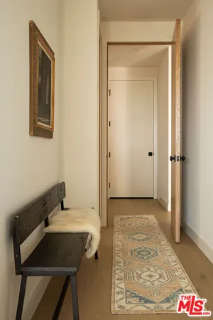 a view of a bathroom with sink and mirror