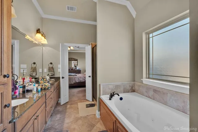 a kitchen with sink cabinets and stove