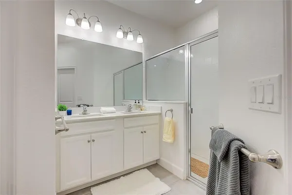 a patio with a patio table and chairs