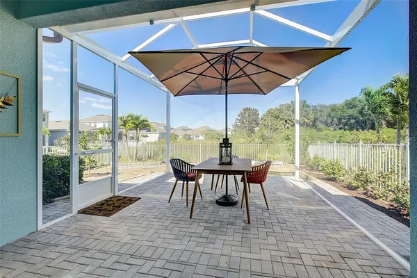 a view of a room with a balcony and chair