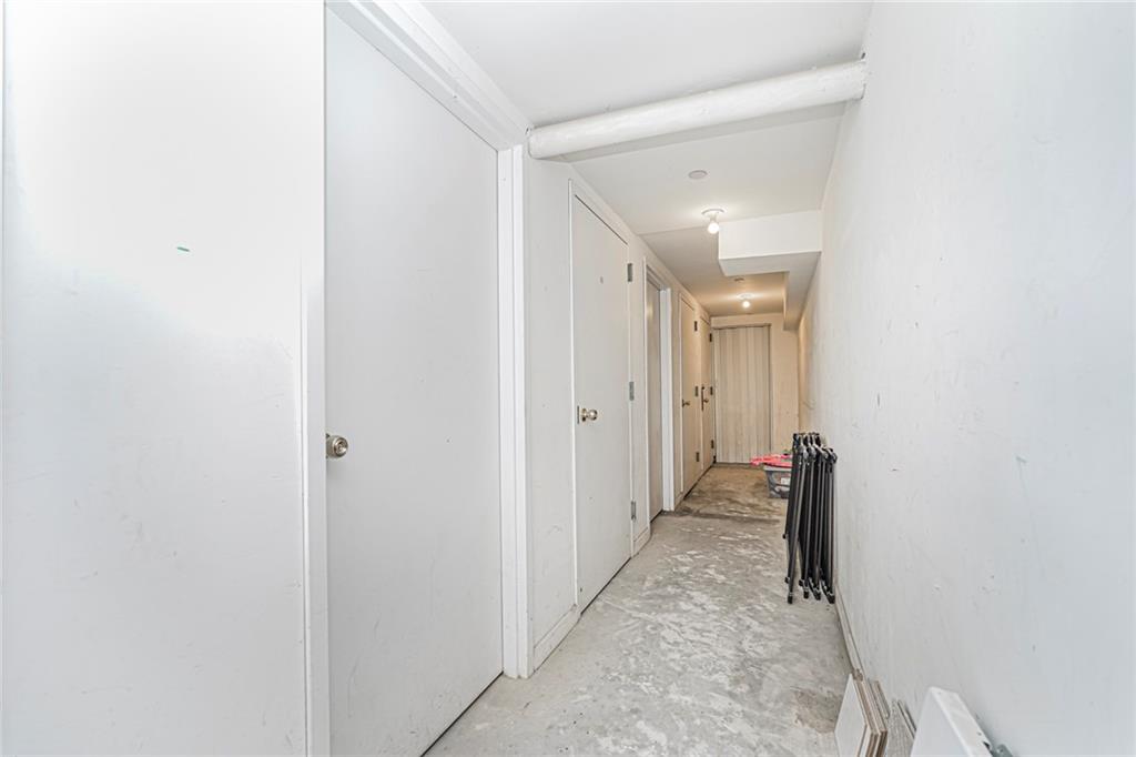 1838 West 13th Street, Unit 3B Brooklyn, NY 11223 - Photo 21 of 22 a view of a hallway with white walls