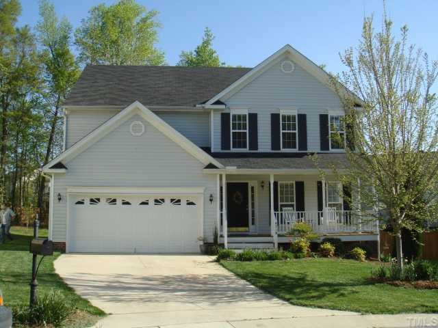4719 Drewbridge Way Raleigh, NC 27604 - Photo 1 of 12 front view of a house with a yard