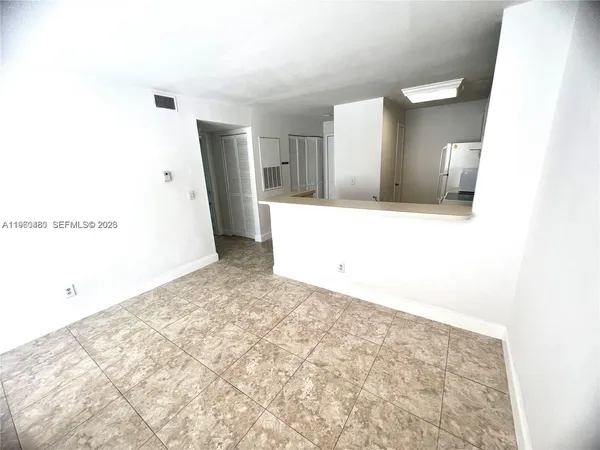 a bathroom with a sink a toilet and a shower