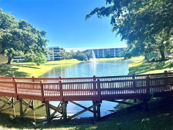 a view of swimming pool with a patio