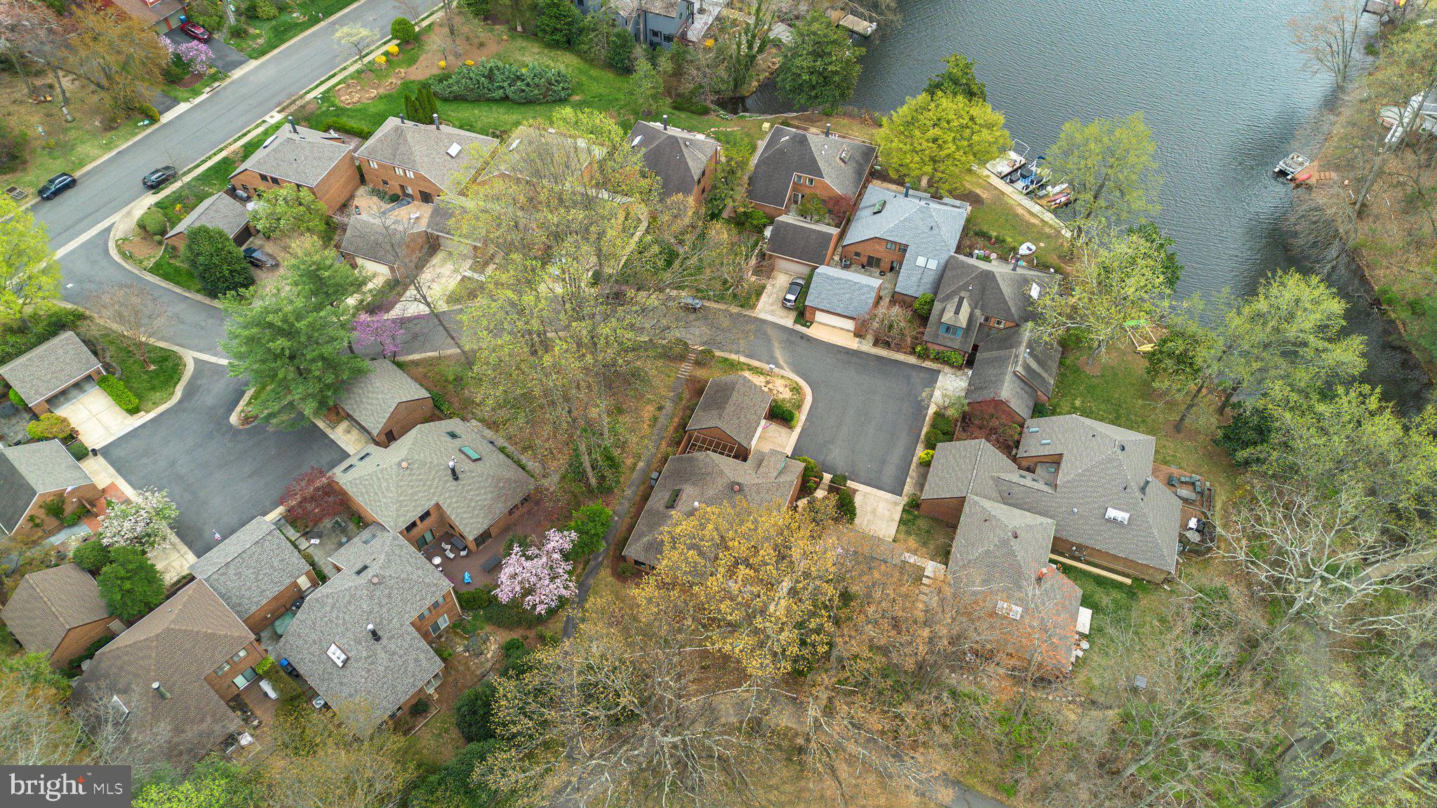 11310 Harborside Cluster Reston, VA 20191 - Photo 72 of 74 an aerial view of a house with a yard and garden