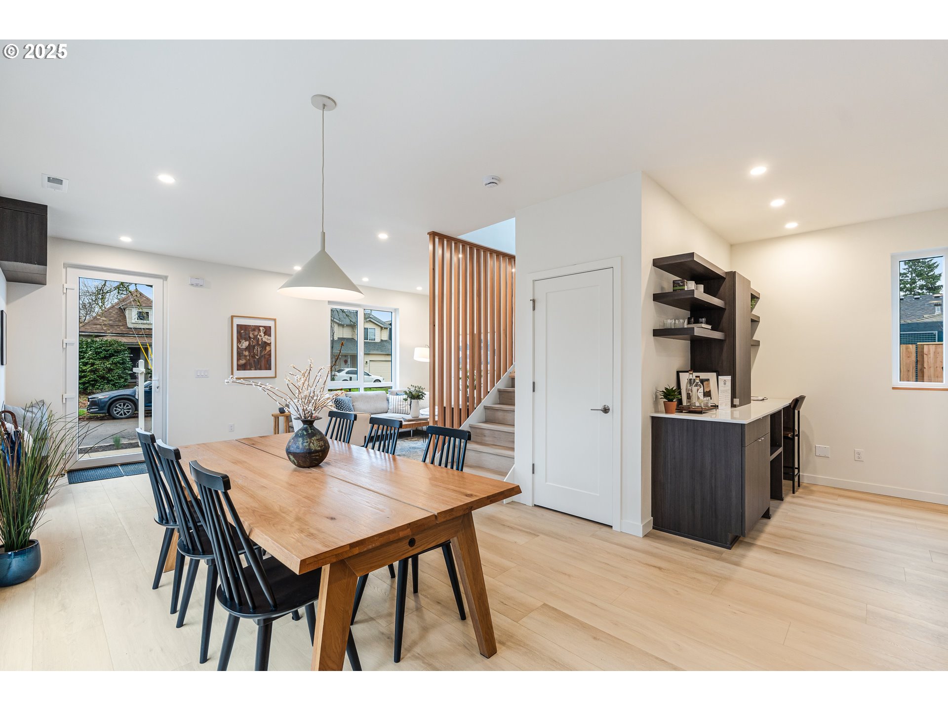 5490 Southeast Boise Street Portland, OR 97206 - Photo 14 of 48 a view of a dining room with furniture window and wooden floor