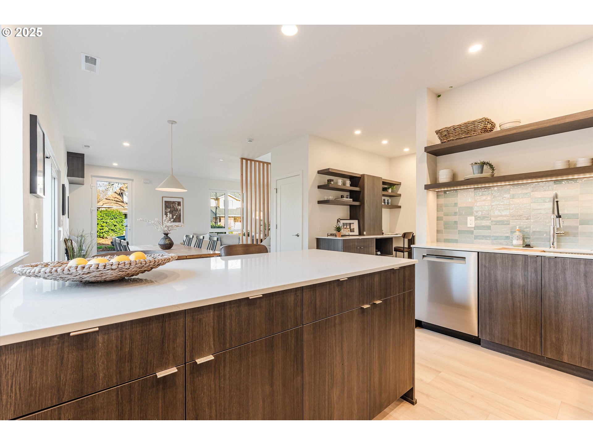 5490 Southeast Boise Street Portland, OR 97206 - Photo 16 of 48 a kitchen with a sink and cabinets