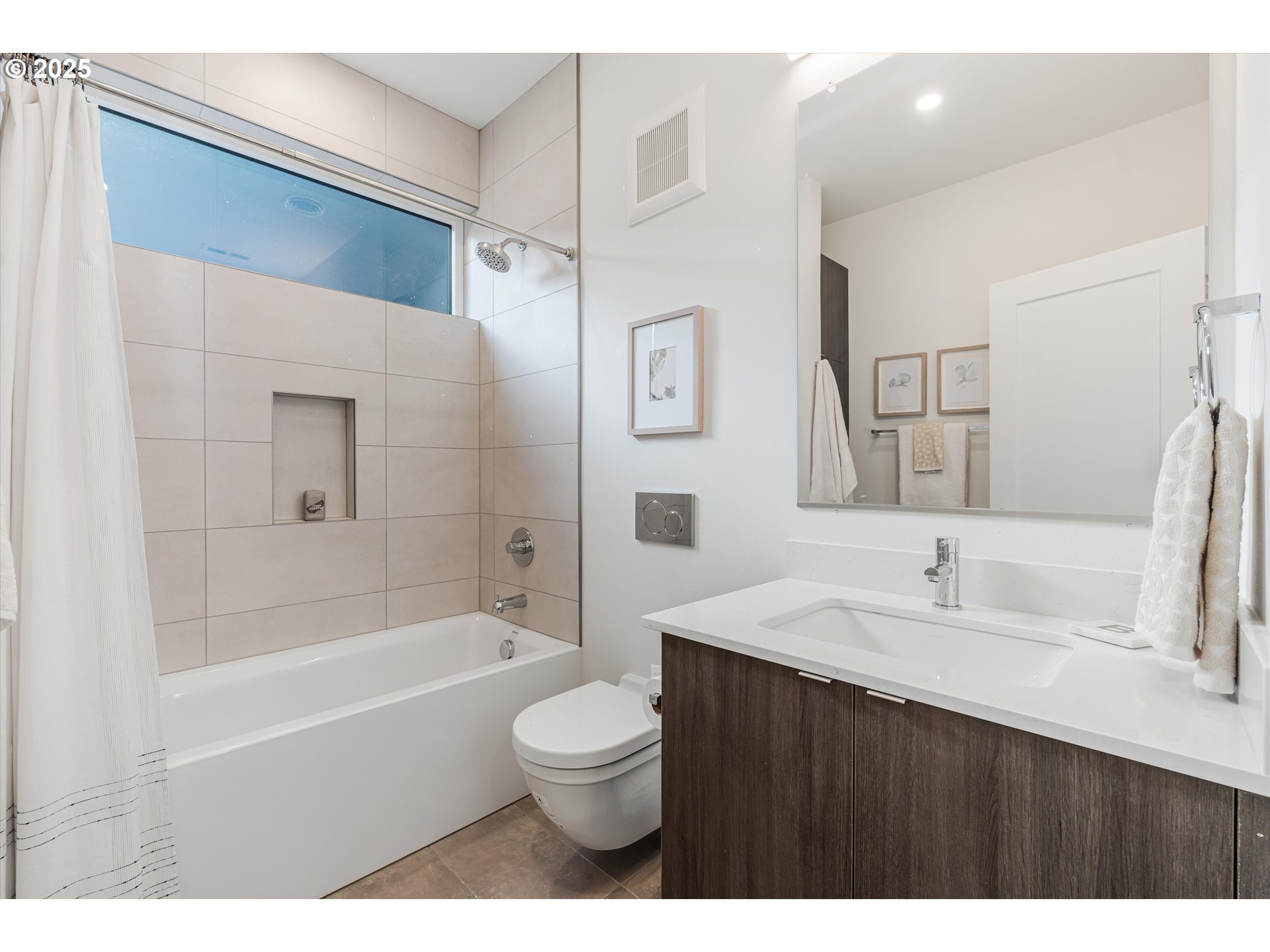 5490 Southeast Boise Street Portland, OR 97206 - Photo 19 of 48 a bathroom with a sink a toilet and shower