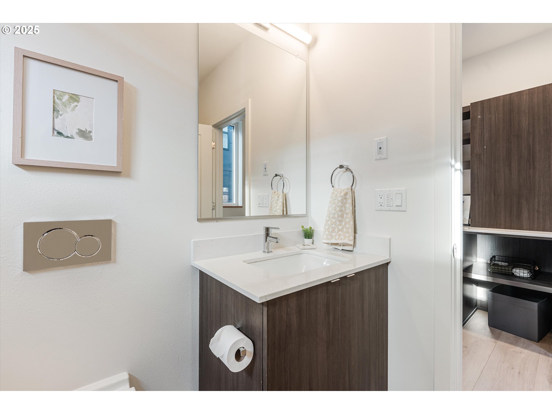 5490 Southeast Boise Street Portland, OR 97206 - Photo 20 of 48 a bathroom with a sink and a mirror