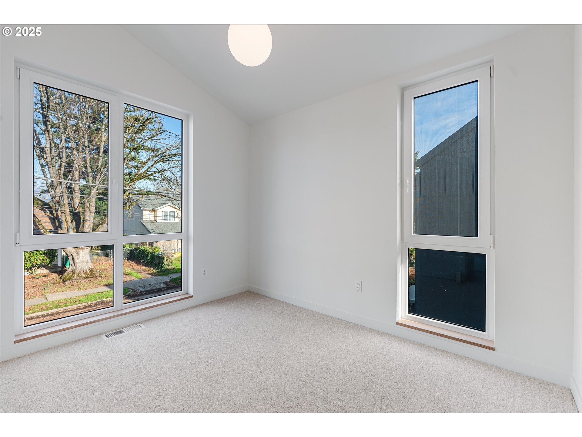 5490 Southeast Boise Street Portland, OR 97206 - Photo 25 of 48 a view of an empty room with window