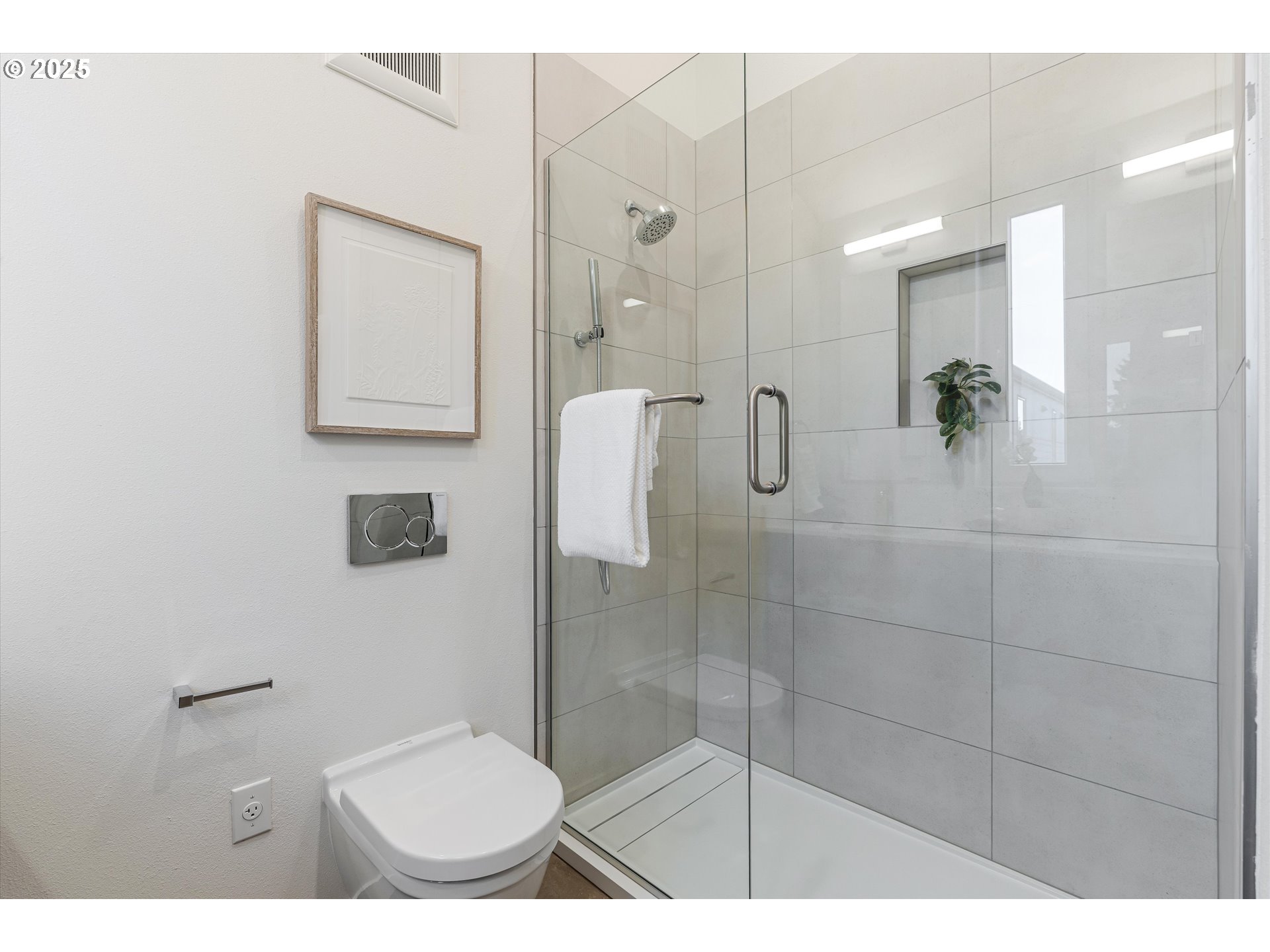 5490 Southeast Boise Street Portland, OR 97206 - Photo 30 of 48 a bathroom with a toilet and a shower